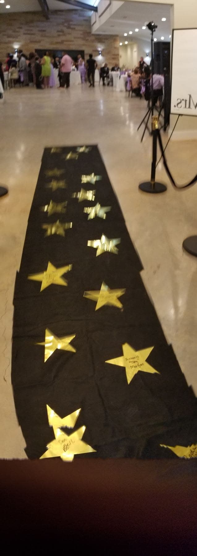 Gold stars create a Hollywood walk-of-fame entrance at Prima Vista