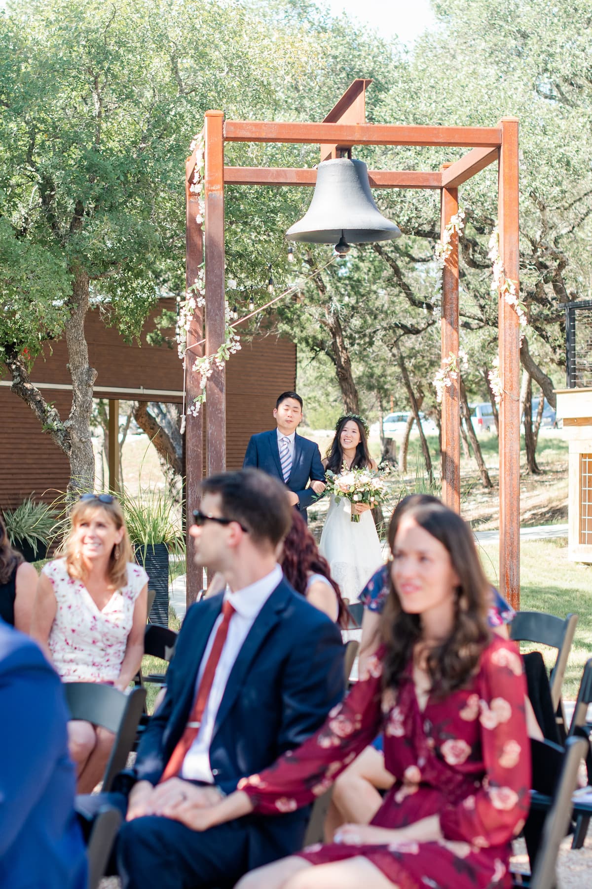 Wedding ceremony processional moment at a Hill Country venue