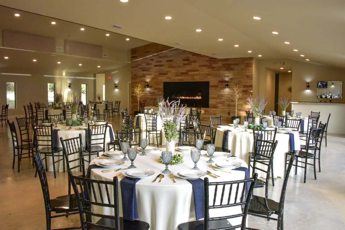 Reception hall in daytime light showing wedding venue rental inclusions