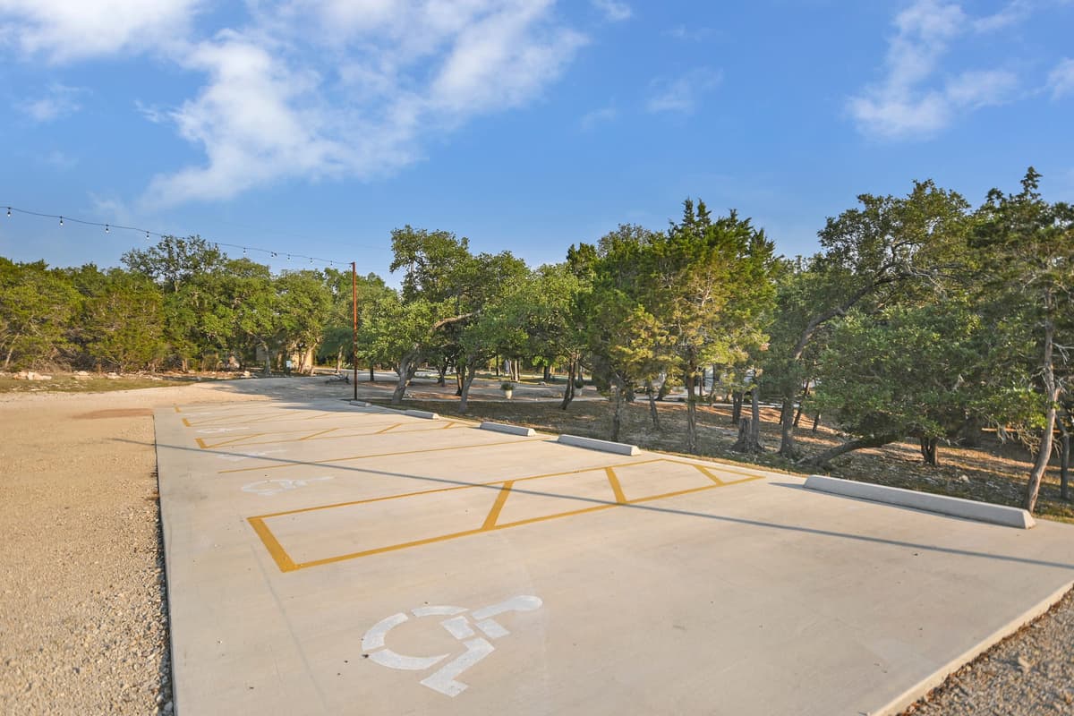Marked accessible parking spaces beside Prima Vista's guest route