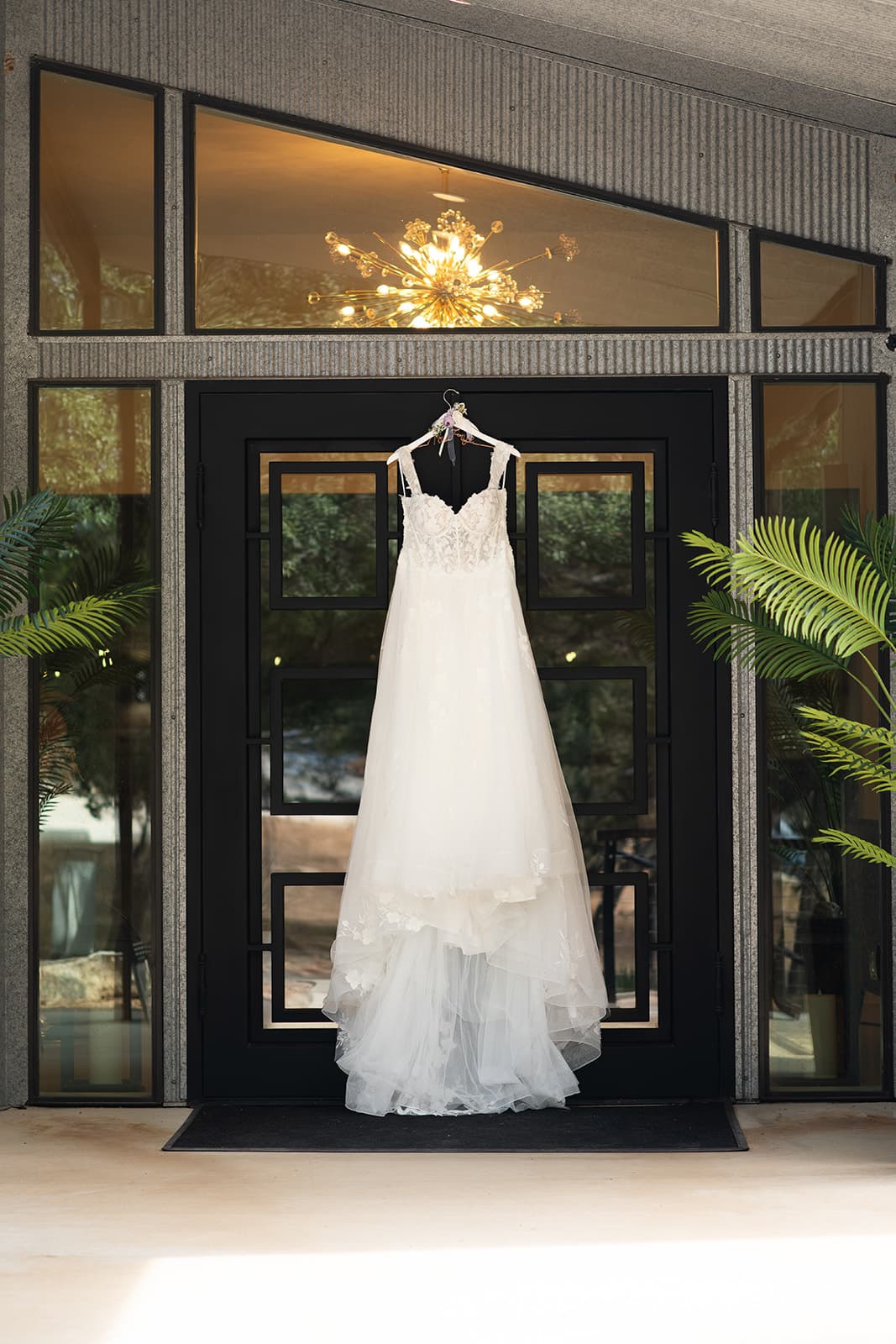 Nicole's wedding dress displayed at the entrance of Prima Vista