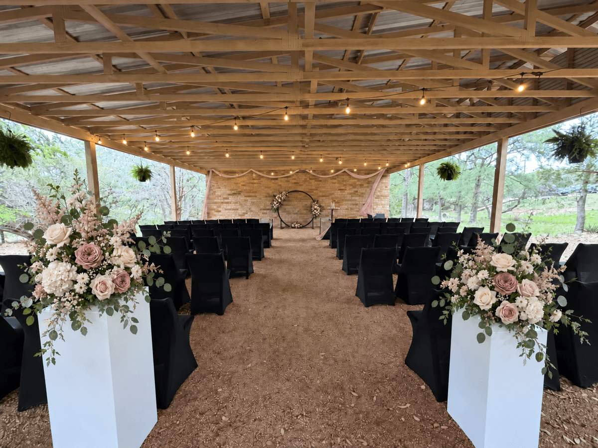 Romantic garden ceremony beneath the Prima Vista pavilion