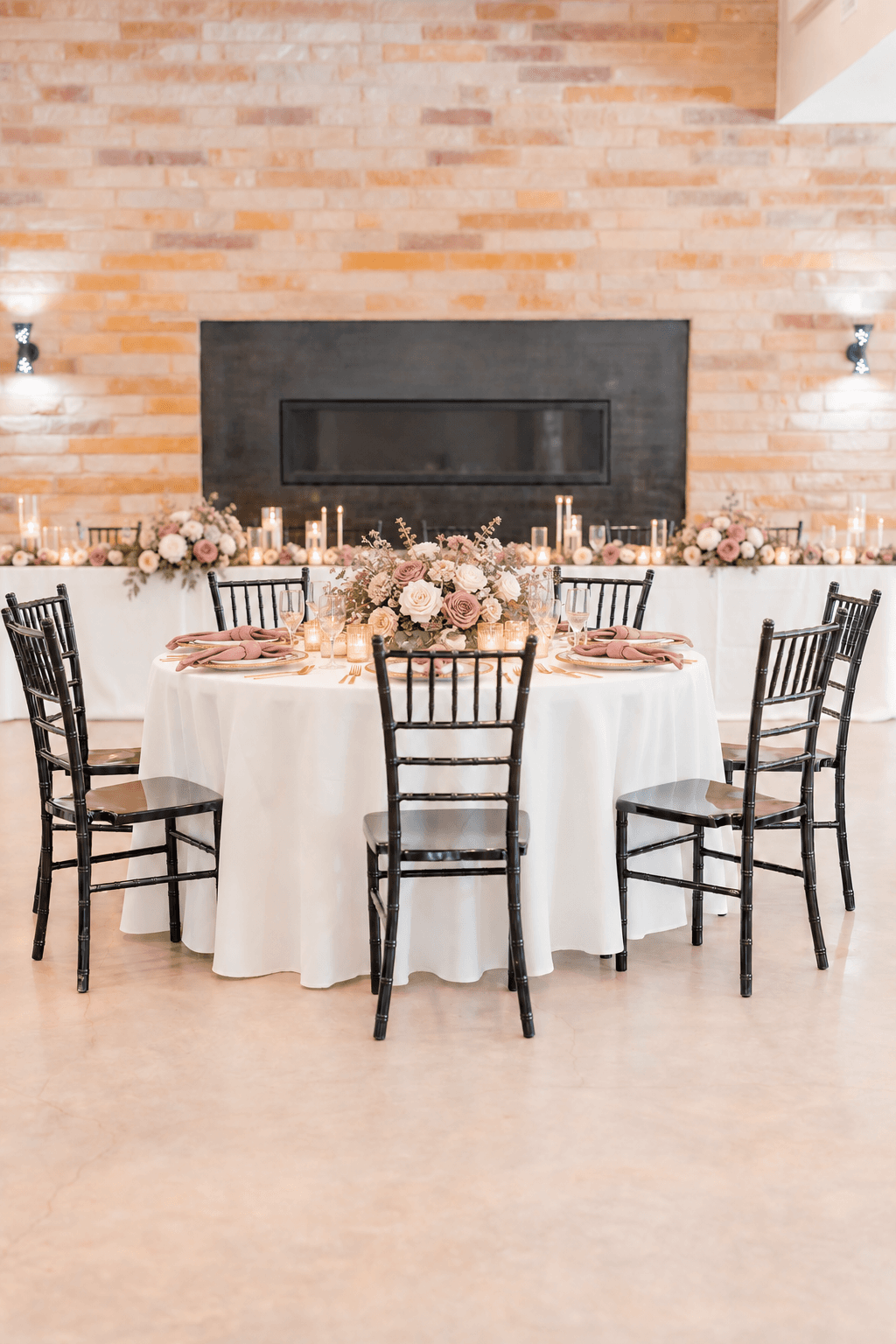 Low floral table design in dusty rose and ivory