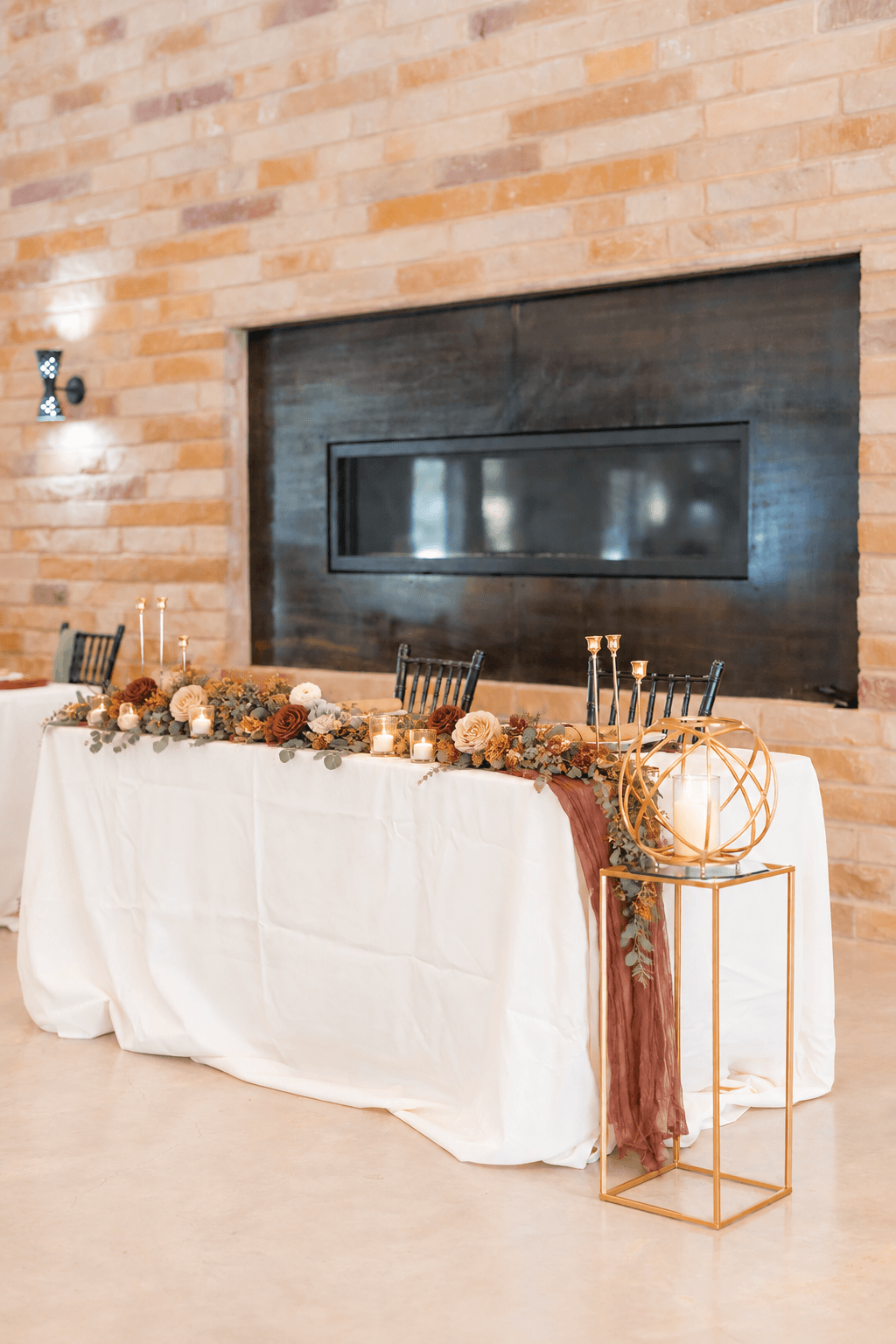 Hill Country Sunset sweetheart table with warm florals