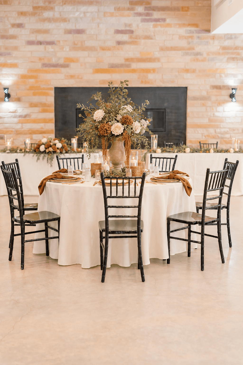 Camel textiles, woven accents, and rust botanicals