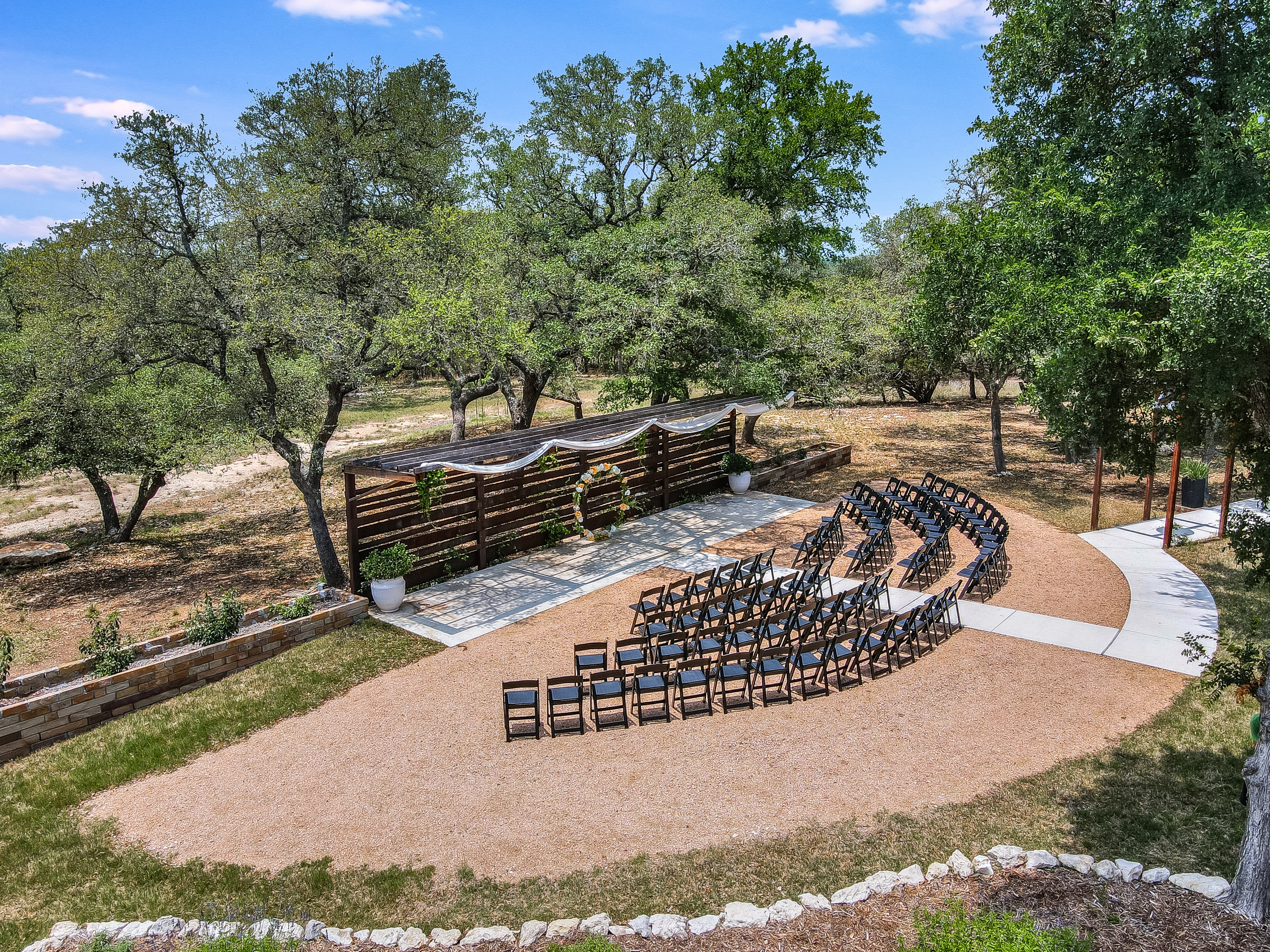 Aerial view of the stunning wedding ceremony site at Prima Vista in the Texas Hill Country